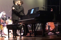 Malik-hugs-Fernandes-Midwest-Premiere